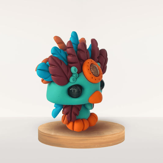 Talisman Plume Azur – création artisanale en pâte Fimo