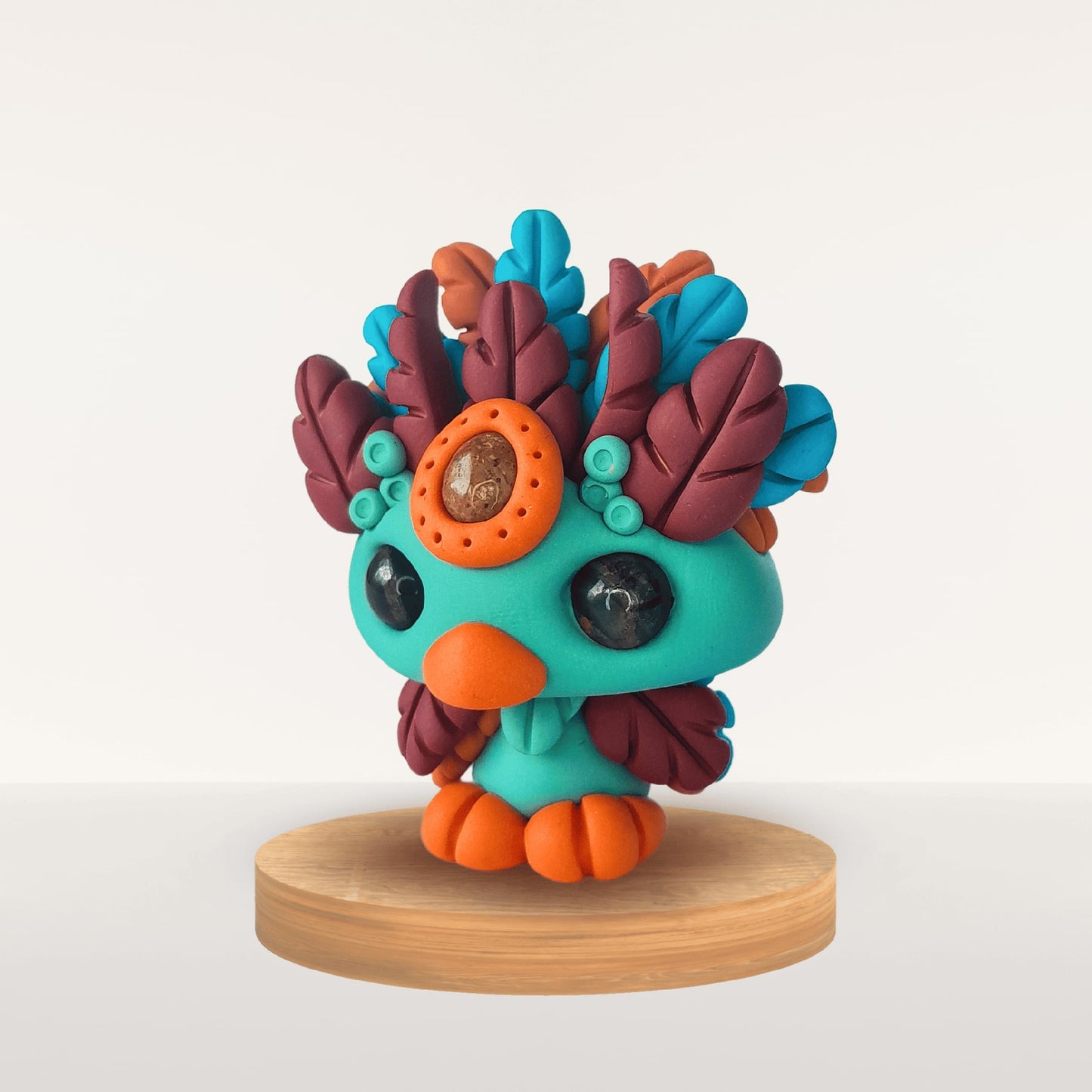 Talisman en Fimo – plume azur pour sérénité et douceur
