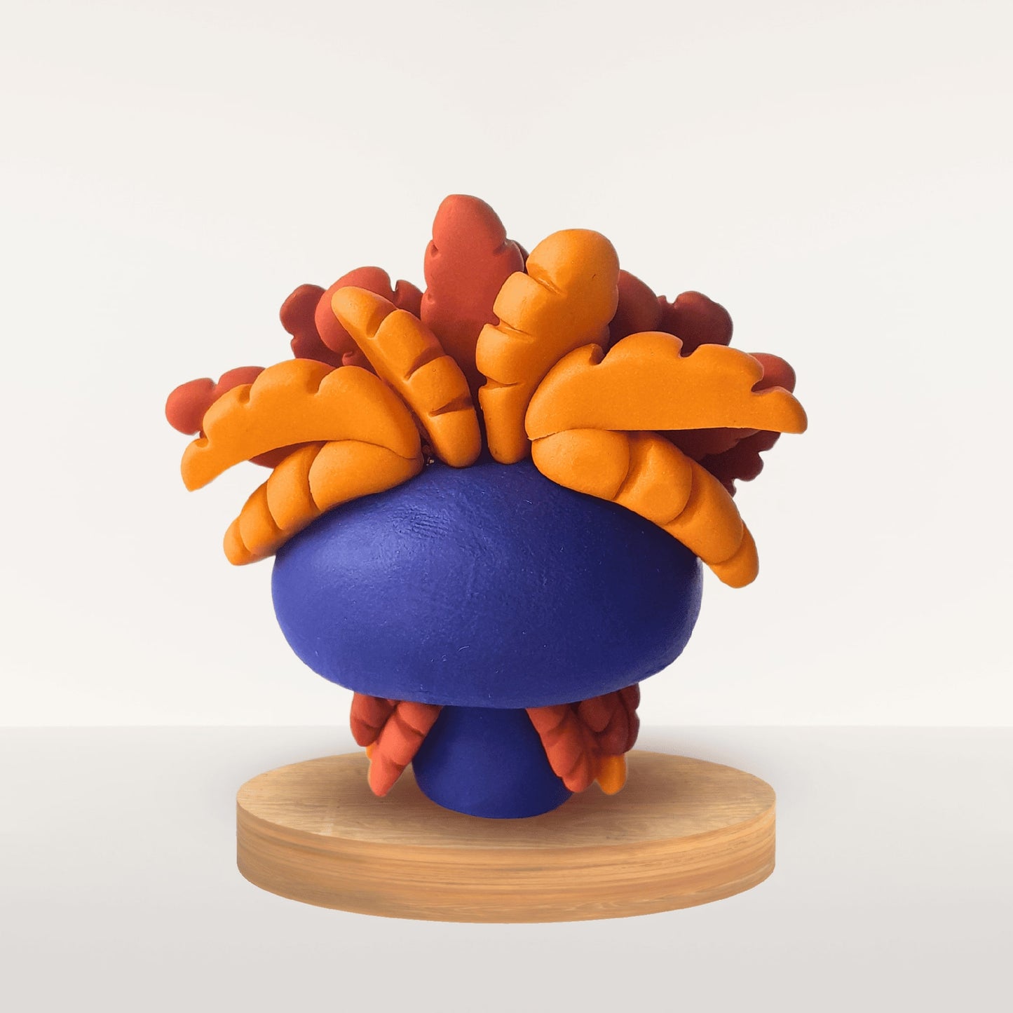 Talisman Plume Indigo – création artisanale en pâte Fimo