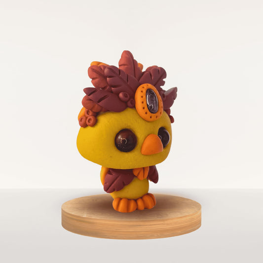 Talisman Plume Safran – création artisanale en pâte Fimo