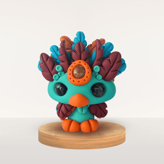 Plume Fimo azur – talisman apaisant et inspirant