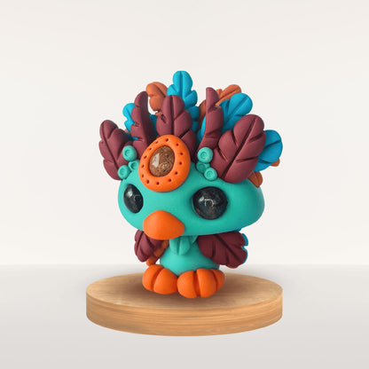 Talisman en Fimo – plume azur pour sérénité et douceur
